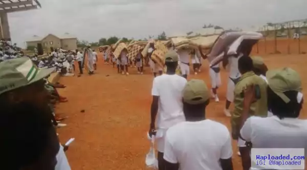 Corpers made to carry their beds on their head and march around for waking up late
